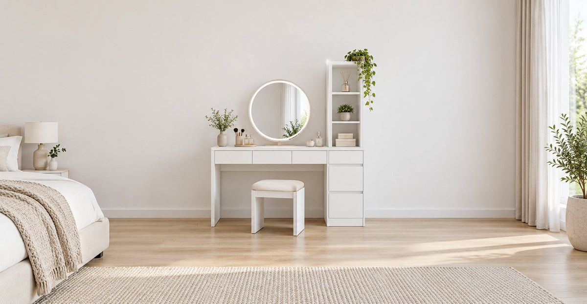 Matte white dressing table with drawers, side shelves and round mirror in a Scandinavian bedroom