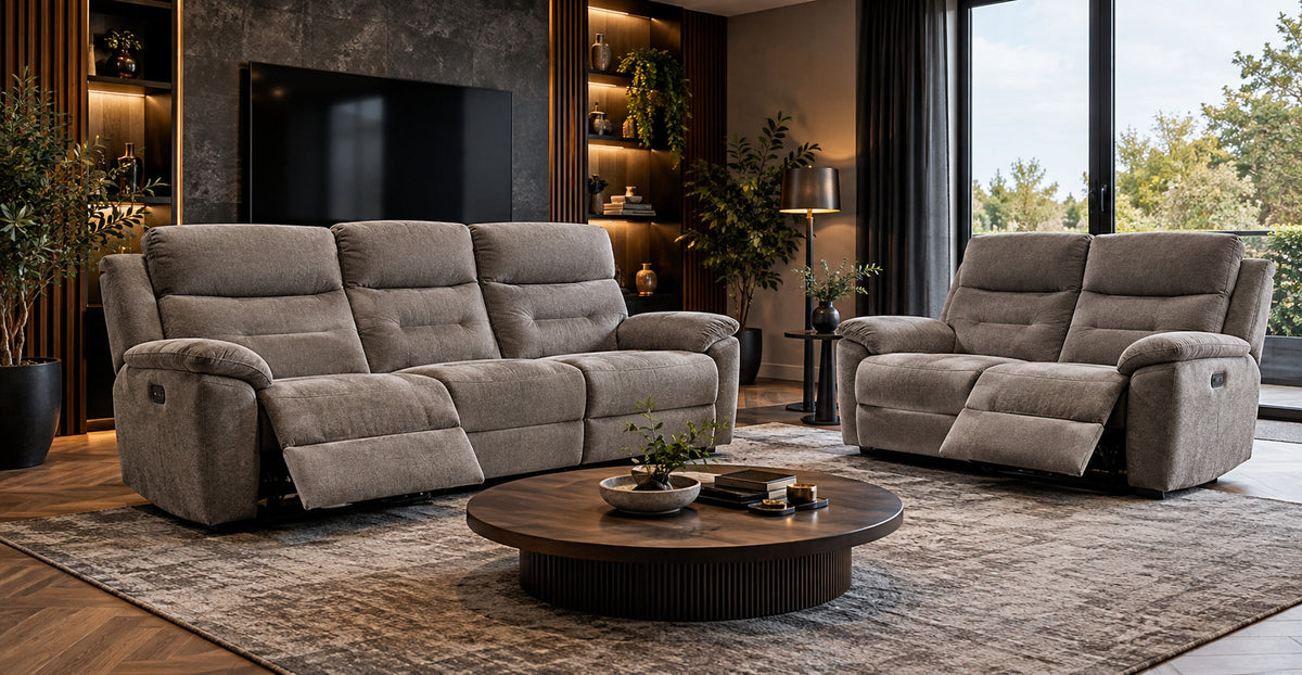 Richmond electric reclining three-seater and two-seater sofa set in a contemporary media room — Ivaaj