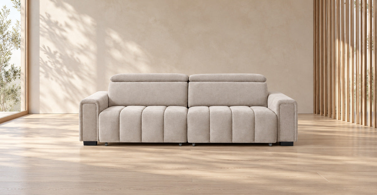 Beige three-seat sofa bed in a calm Japandi living room