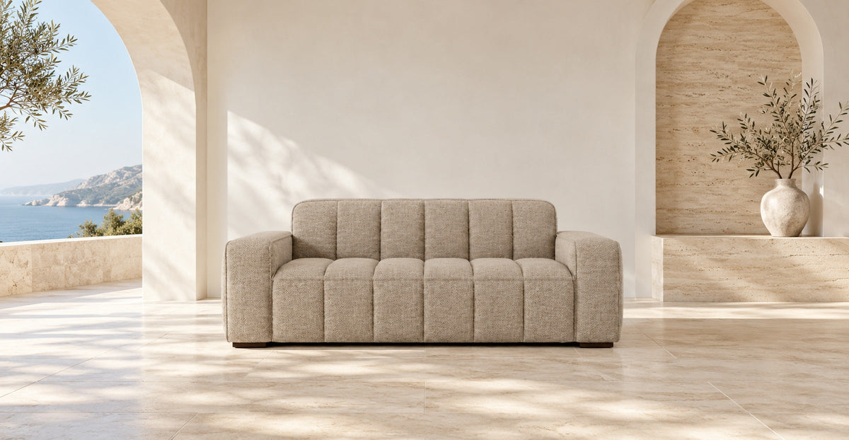Beige three-seat sofa in a refined Mediterranean modern interior