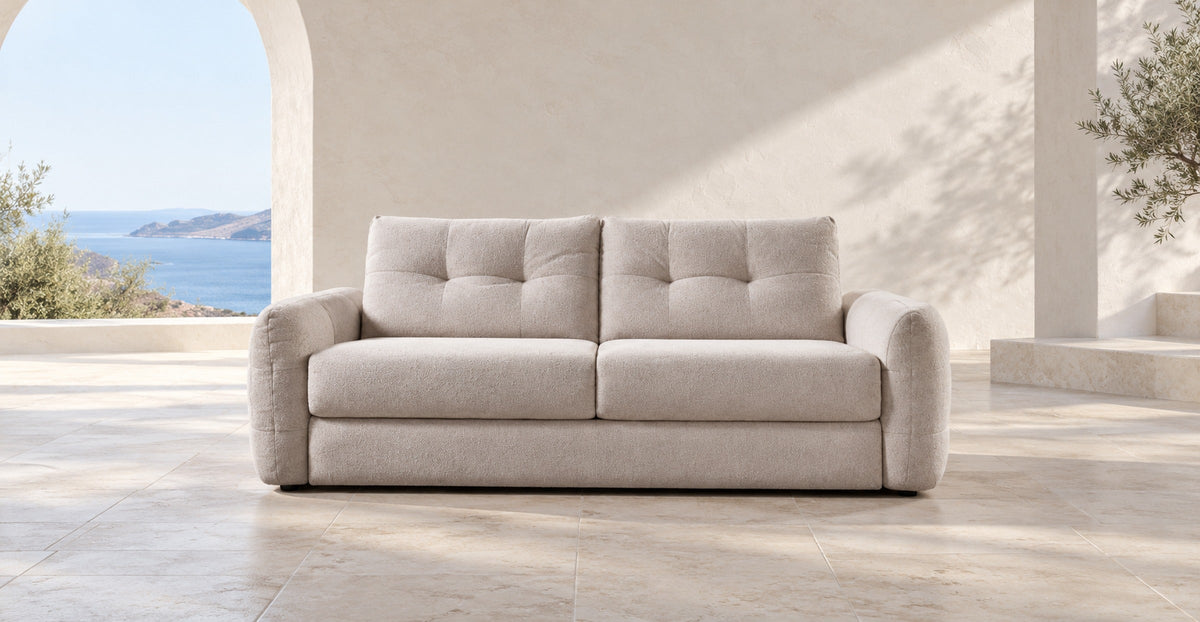 Beige Athens three-seat sofa bed in a Mediterranean-inspired interior