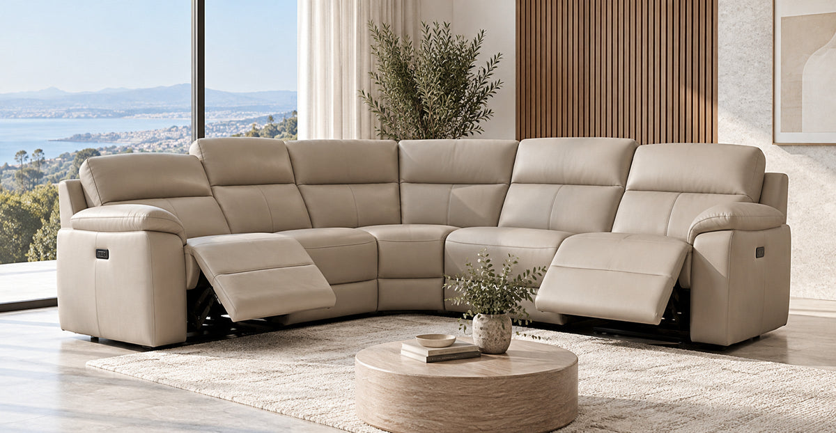 Large corner recliner sofa with extended footrests in a modern living room — Ivaaj