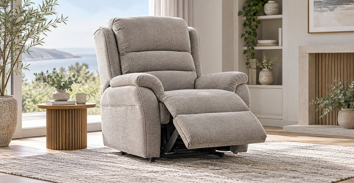 Cornwall upholstered rise and recline massage chair with extended footrest in a calm reading corner — Ivaaj