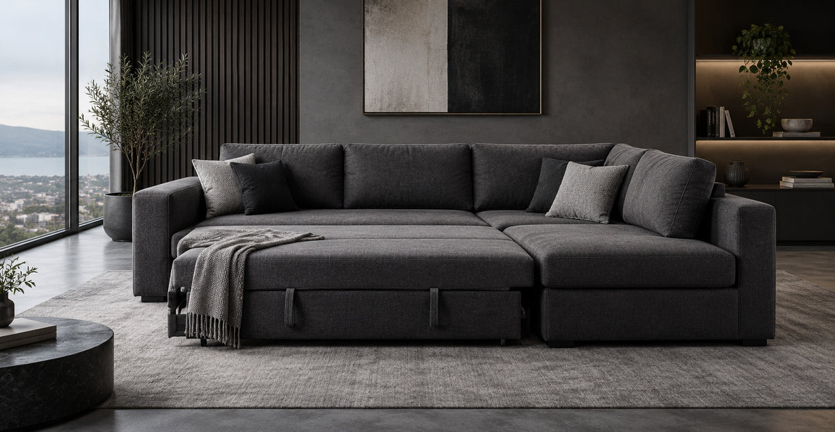 Montrose dark grey convertible corner sofa bed in a moody modern apartment — Ivaaj