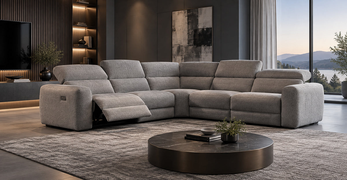 Ohio electric reclining corner sofa with extended footrest in a contemporary media lounge — Ivaaj